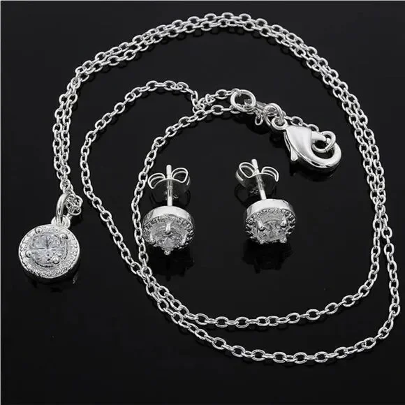 The Dainty Solitaire pendant necklace and stud earrings set in sterling silver - Picture 3 of 6